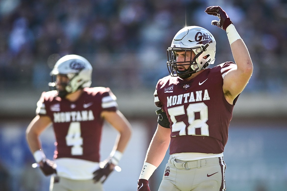 Montana linebacker Patrick O'Connell (58) motions to the crowd to make some noise in the first quarter against Idaho at Washington-Grizzly Stadium on Saturday, Oct. 15. (Casey Kreider/Daily Inter Lake)