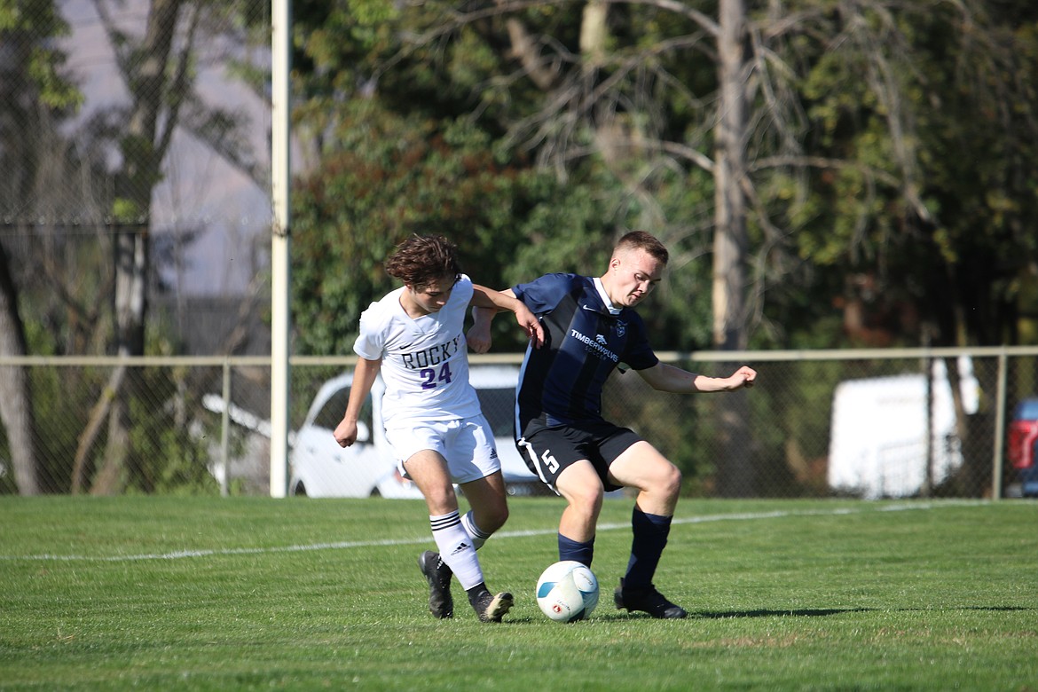 Photo by ZAC CHAN
Lake City junior midfielder Aidan Stewart tackles the ball away from a Rocky Mountain player during a state 5A play-in match on Saturday at Walker Field in Lewiston.