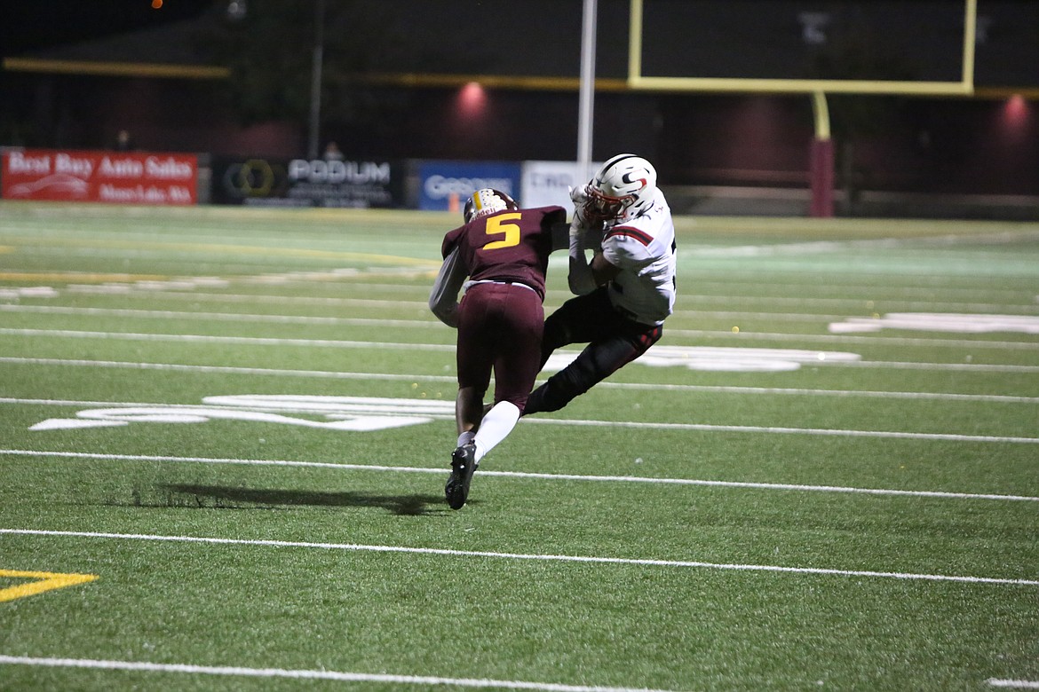 Moses Lake defensive back Kyson Thomas lays out a big hit on a Sunnyside receiver.