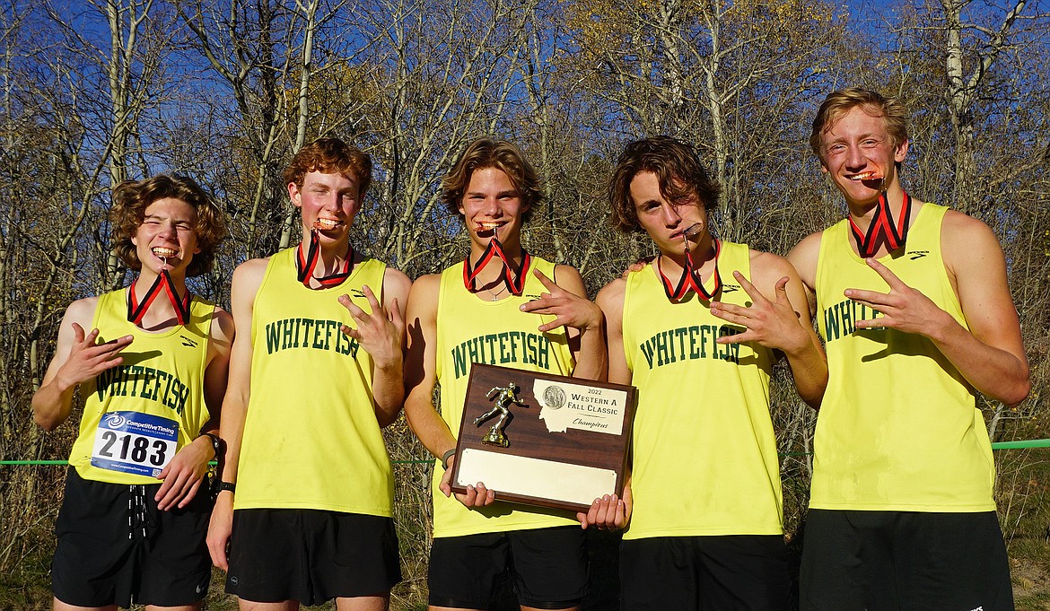 The Whitefish Bulldog boys cross country team were crowned as Western A divisional champions on Saturday in East Glacier. From left to right is sophomore Ethan Amick, senior Nate Ingelfinger, junior Mason Genovese, junior Deneb Linton and senior Ruedi Steiner. (Matt Weller photo)