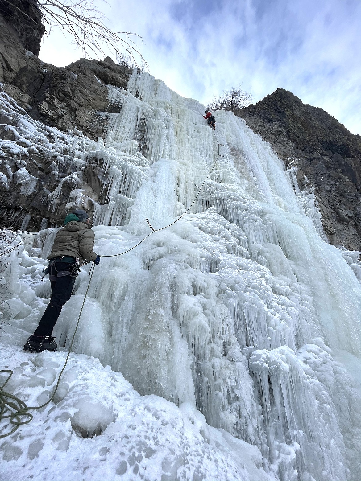 Dave Wood, Wenatchee (left), belays Erik Koch, Ephrata, who led this ice route in the Ancient Lakes area southwest of Quincy in early January.