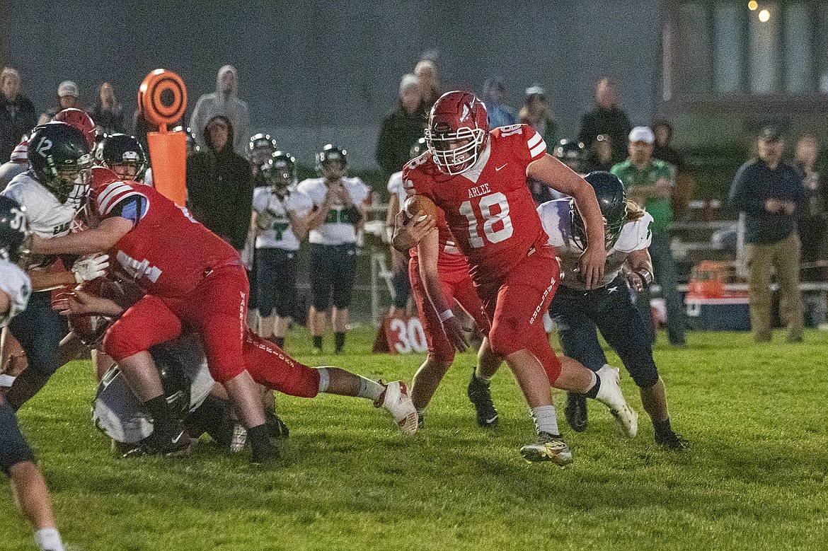 Arlee Warrior running back Jake Knoll rushes for a first down. (Rob Zolman/ Lake County Leader)