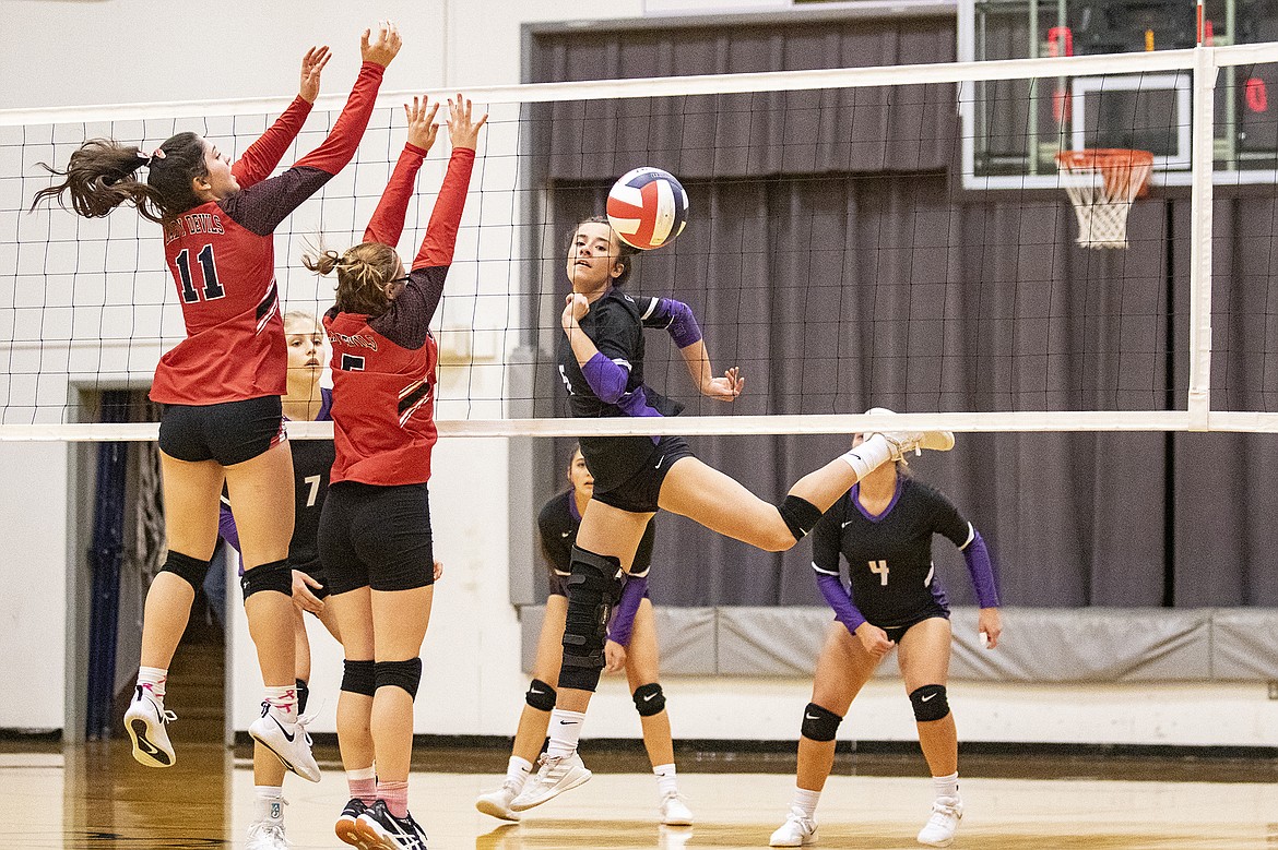 Charlo Lady Viking Hayleigh Smith taps one past the Noxon defenders. (Rob Zolman/ Lake County Leader)