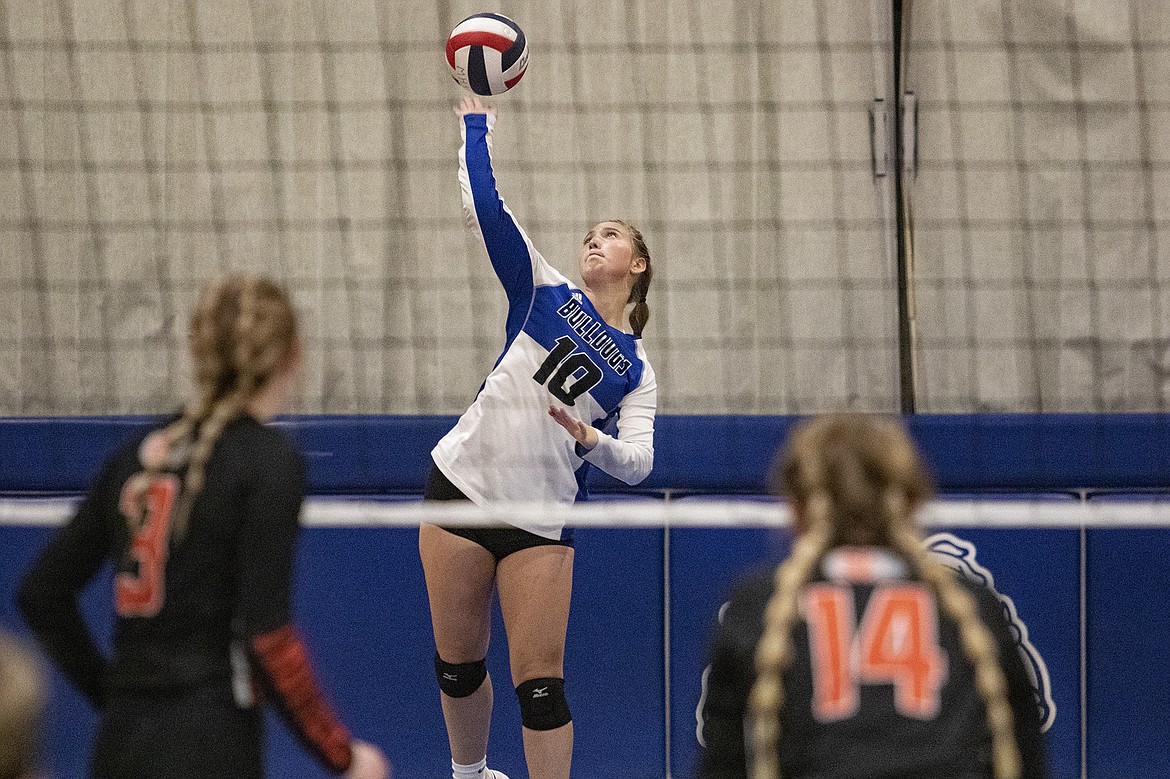 Mission Lady Bulldog Izzy Evans fires a serve over the net. (Rob Zolman/ Lake County Leader)