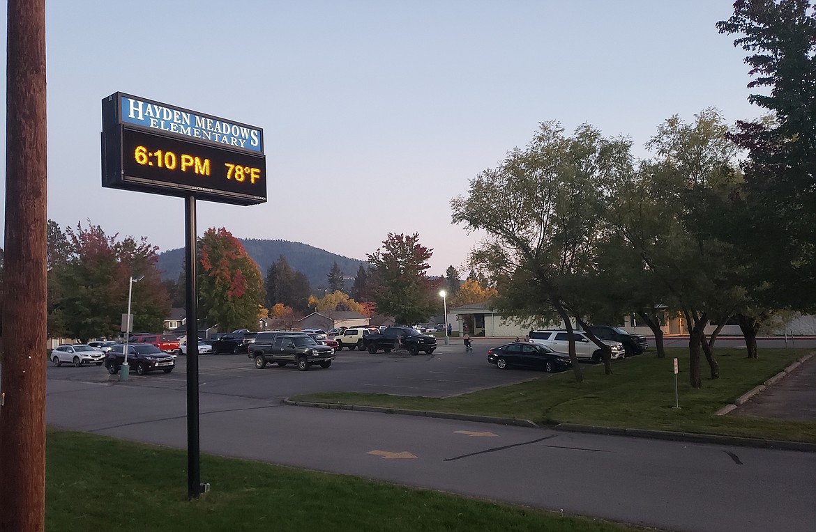 Hayden Meadows Elementary School parking lot at dusk, where the third annual Friday Night Frights Trunk or Treat will take place Oct. 28.