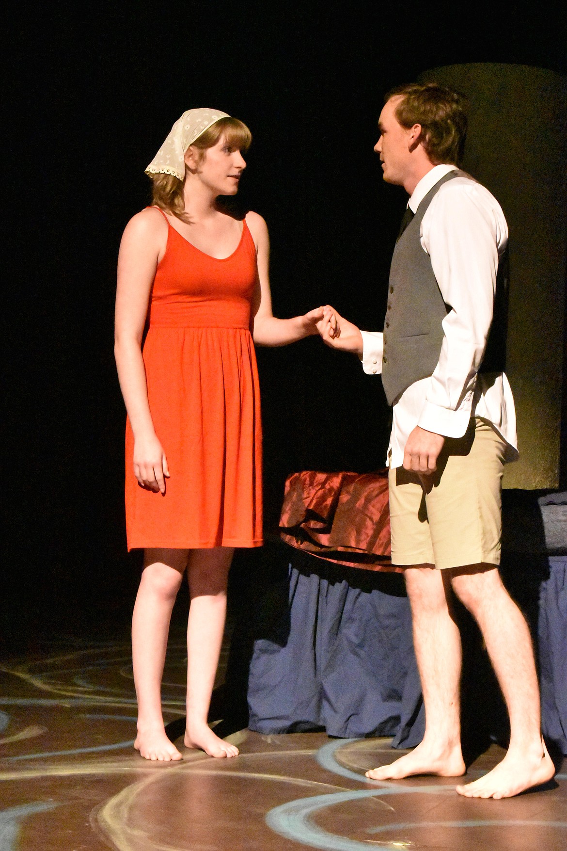 Ti Moune, played by Ruth Bresee (left), a peasant girl who rescues and falls in love with Daniel, played by Taggart Hodges (right), a wealthy young man from the other side of her island in the musical “Once on this Island.”