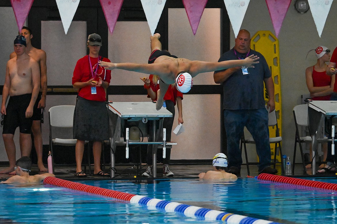 Max Zuberbuhler dives off the starting block during a meet at the Kroc Center this weekend.