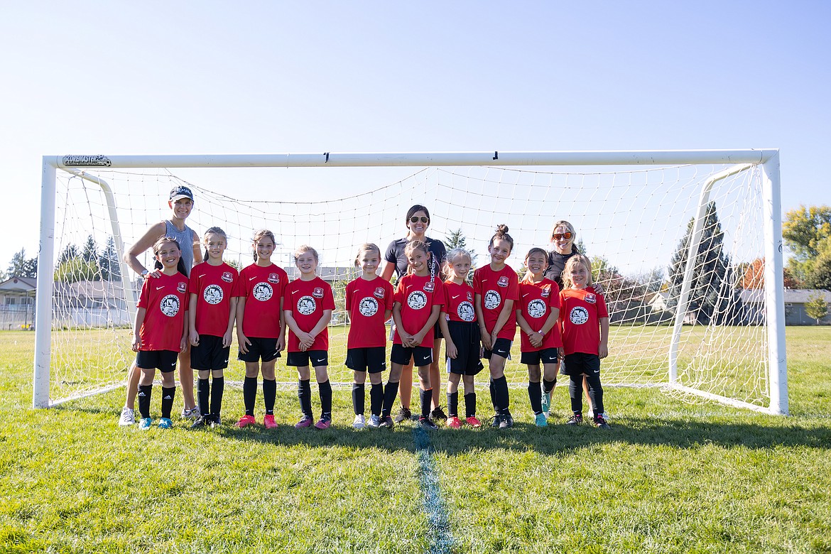 Photo by BUSCEMA PHOTOGRAPHY
The Thorns North FC 2014 Girls yellow soccer team lost to EW Surf on Saturday at home in league play. In the front row from left are Poppy Moreau, Finley Rauscher, Brielle Buscema, Harper Andersen, Quinn Baily, Audrey Rietze, Hatty Lemmon, Liv Mickelson, Finley Martin and Ellie Carper; and back row from left, coaches Kara Lemmon, Katie Martin and Jean Carper.