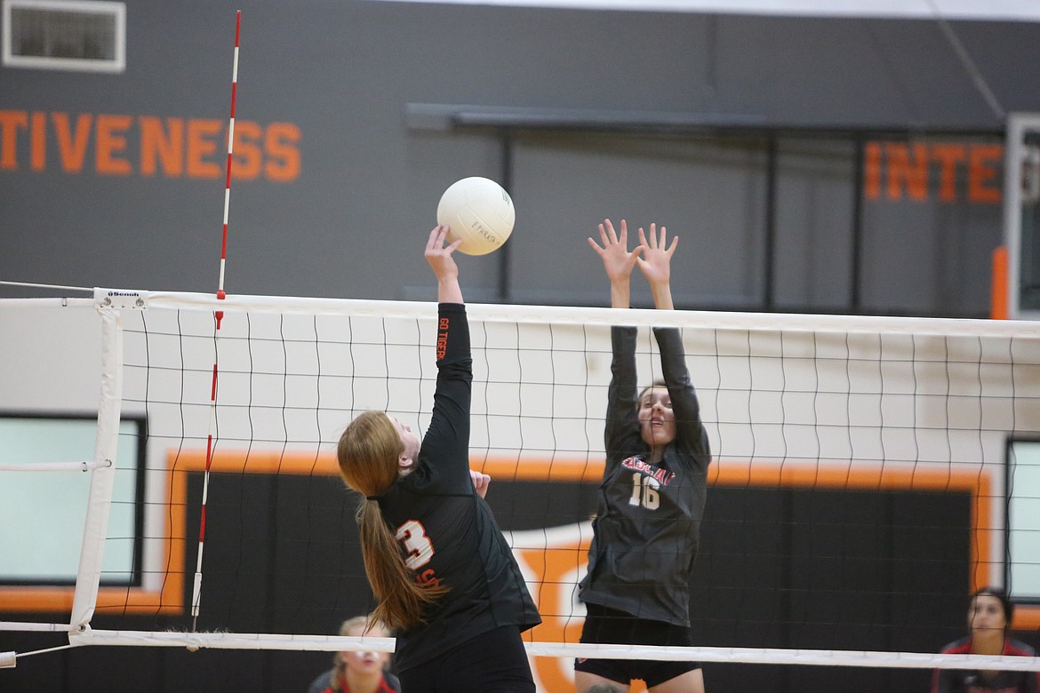 Ephrata’s Molly Evenson attempts to tip the ball past a Cascade blocker during a match on Sept. 6.