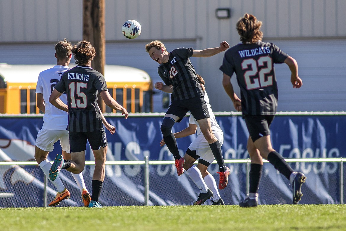 Senior Andrew Miner gets a header at Flip Darling Field against Billings Central on Oct. 15 in the quarter final game. (JP Edge photo)