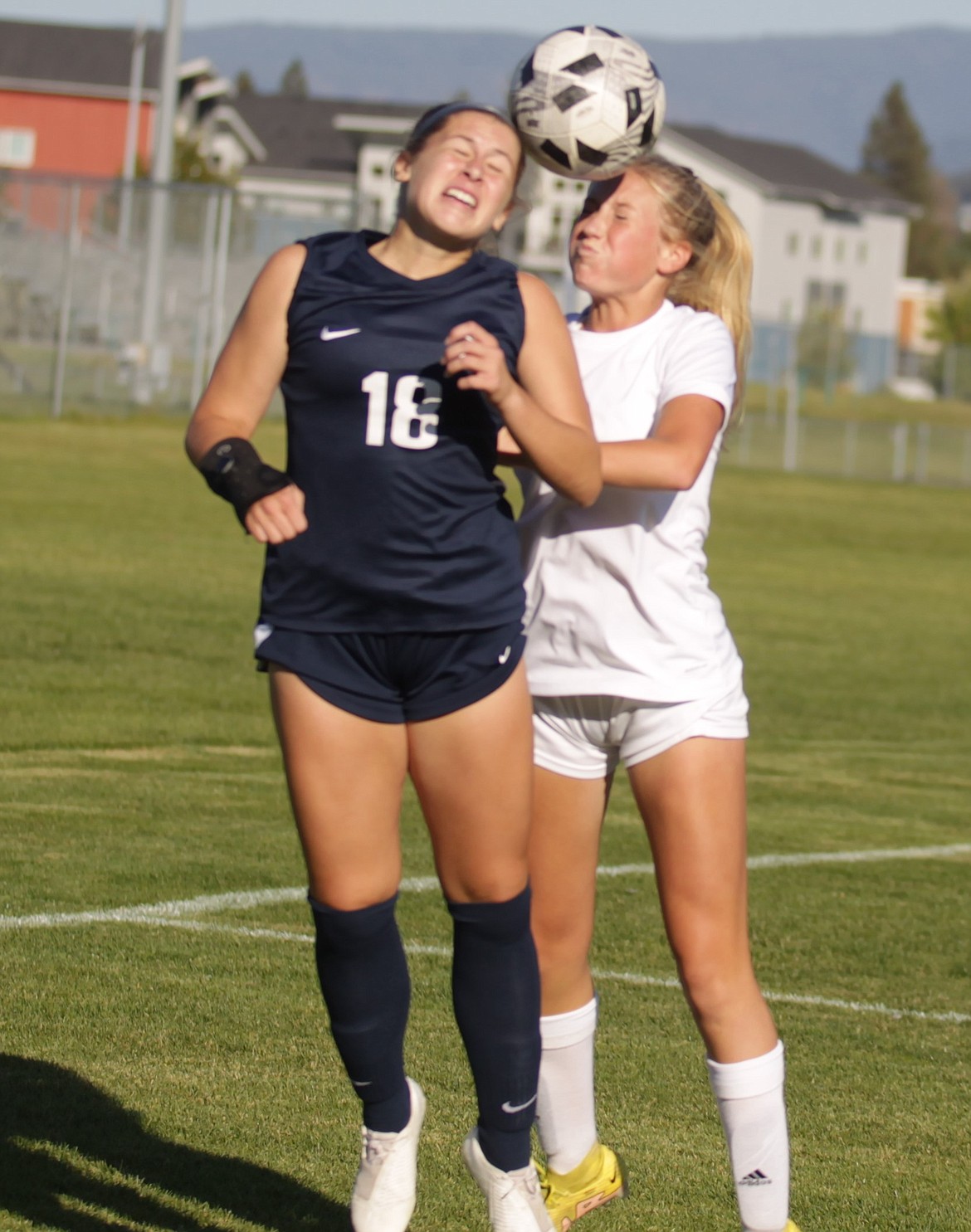 JASON ELLIOTT/Press
Lake City senior forward Elliotte Kortus gets her head on the ball during a throw-in during the first half of the 5A Region 1 girls soccer championship match on Oct. 11.