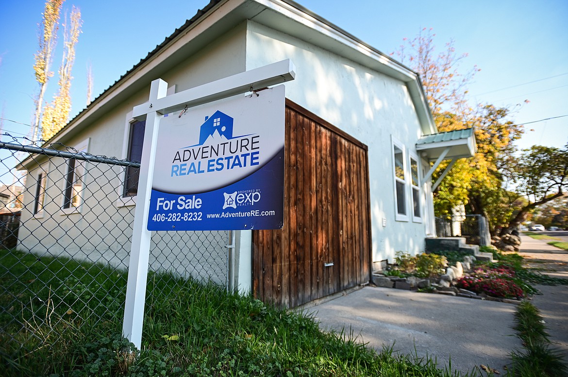 A "for sale" sign outside a home on Second Street West in Kalispell on Wednesday, Oct. 19. (Casey Kreider/Daily Inter Lake)