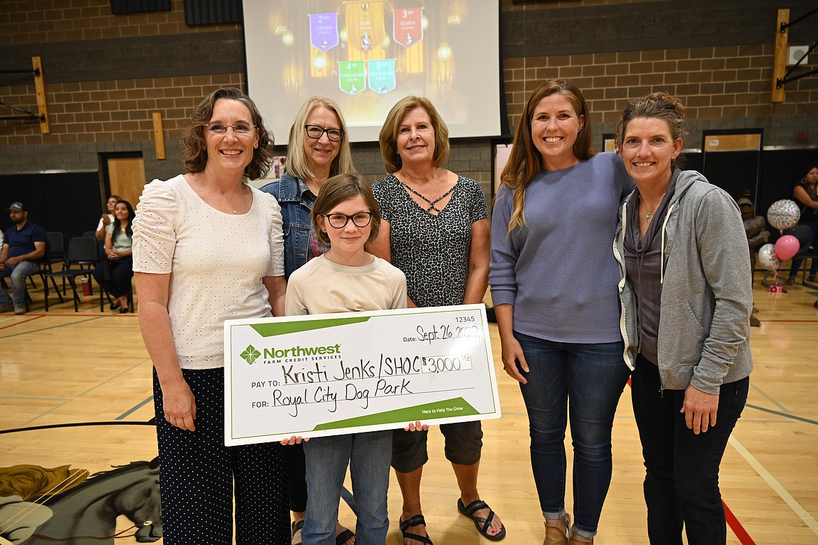 Pictured, from left, are Kristi’s mother Heather Jenks, Georgine Ricker and Cathy Potter of Strengthening the Heart of our Community, and Gretchen Uebelacker and Kriston Weyns of Northwest Farm Credit Services.