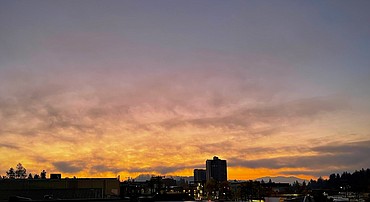 A colorful sunrise is viewed early Thursday morning, looking east from the Lake Towers building on Coeur d'Alene Avenue between First and Second streets in downtown Coeur d'Alene. Photo by reader Judith Yancey.