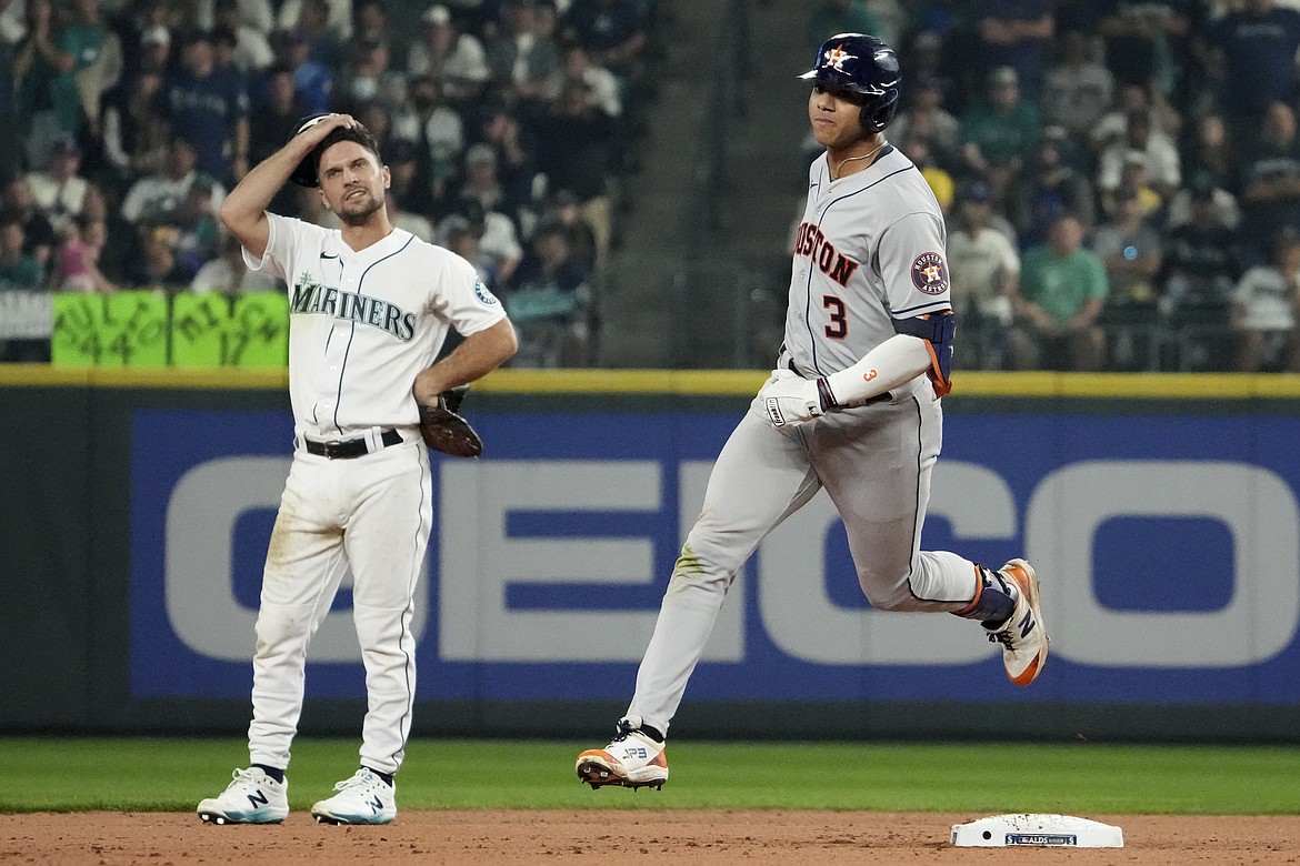 Astros shortstop Jeremy Peña rounds the bases after hitting a solo home run in the top of the 18th inning of the Mariners’ 1-0 loss to the Astros in Game 3 of the ALDS.