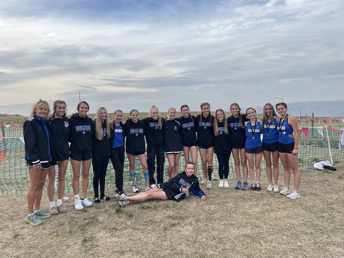 Courtesy photo
The Coeur d'Alene High girls finished runner-up in the 5A Region 1 cross country meet on Thursday in Lewiston. From left are coach Cathy Compton, Elli Rietze, Kira Wood, Dakota Keyworth, Lana Fletcher, Rylee Racanelli, Hadley Green, Audrey Bell, Chloe Frank, Emily Fehling, Brooklyn Brunn, Rebecca Thompson, Olivia May, Ann Marie Dance and Zara Munyer. In the front row is Olivia Fishback.