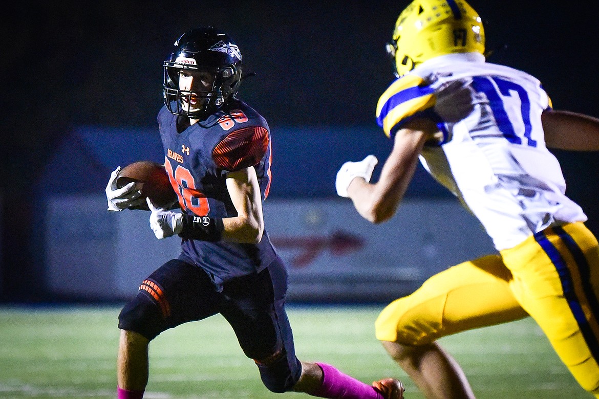 Flathead wide receiver Brody Thornsberry (88) tries to get around the end on a run in the first quarter against Missoula Big Sky at Legends Stadium on Thursday, Oct. 20. (Casey Kreider/Daily Inter Lake)
