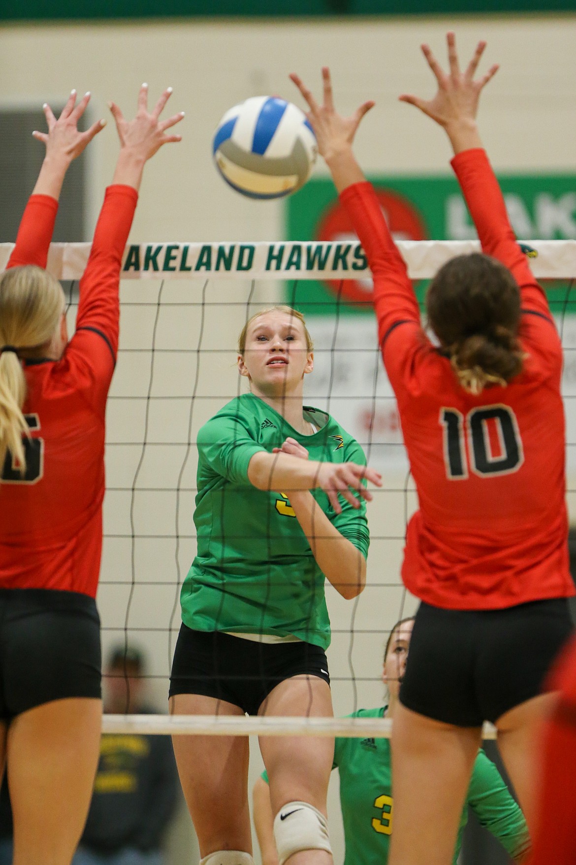 JASON DUCHOW PHOTOGRAPHY
Landree Simon of Lakeland hits against Moscow in the 4A Region 1 volleyball championship match Thursday night in Rathdrum.