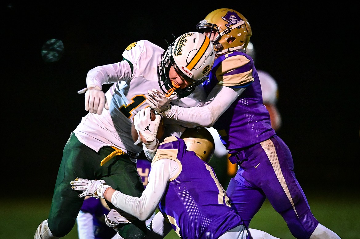 Whitefish wide receiver Mason Kelch (10) fights for extra yardage against the Polson defense in the second quarter at Polson High School on Friday, Oct. 21. (Casey Kreider/Daily Inter Lake)