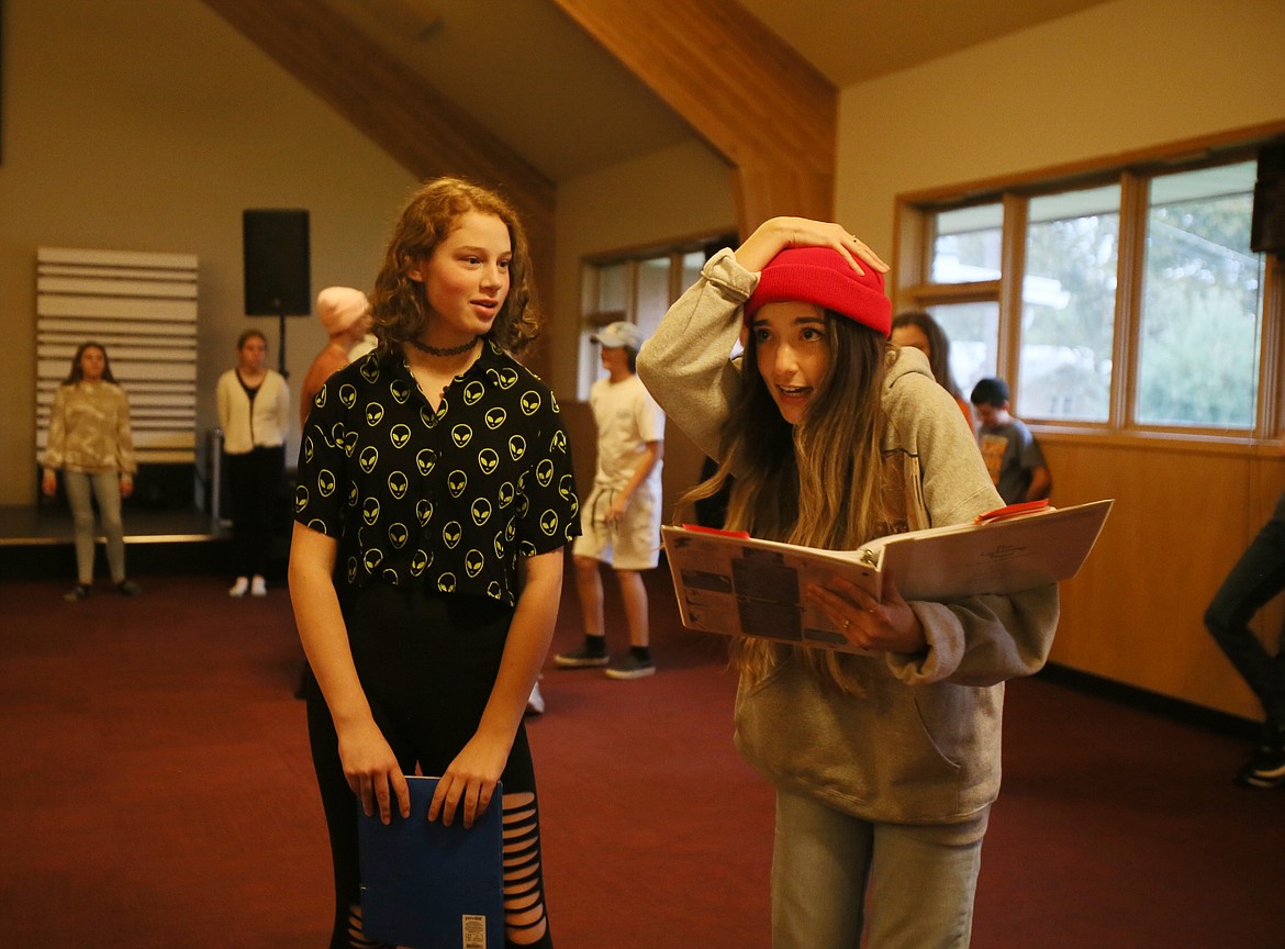 Paisley Siemens gives Natalie Ince, 14, direction for a scene during rehearsal for "The Lightning Thief: The Percy Jackson Musical" on Friday.