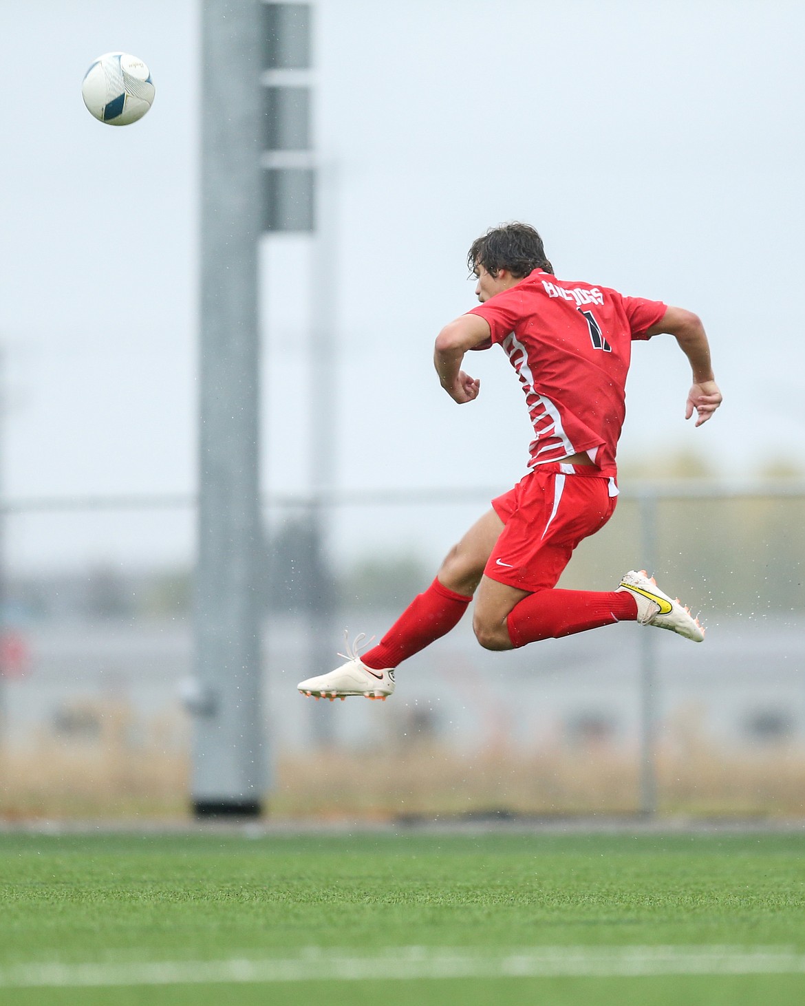 Stirling Roget clears a ball on defense during the Bulldogs game against Century in the consolation bracket of the 4A State Soccer Tournament.