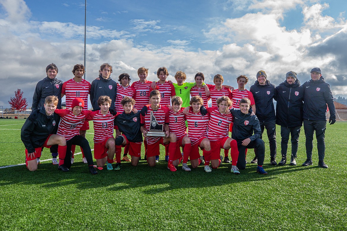 The Sandpoint Bulldogs boys soccer team poses with their fifth-place trophy.