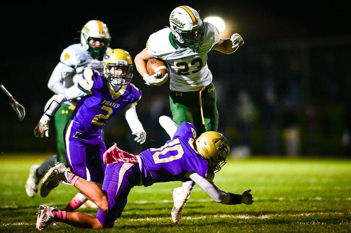 Whitefish running back Ty Schwaiger (23) picks up yardage on a first quarter run against Polson at Polson High School on Friday, Oct. 21. (Casey Kreider/Daily Inter Lake)