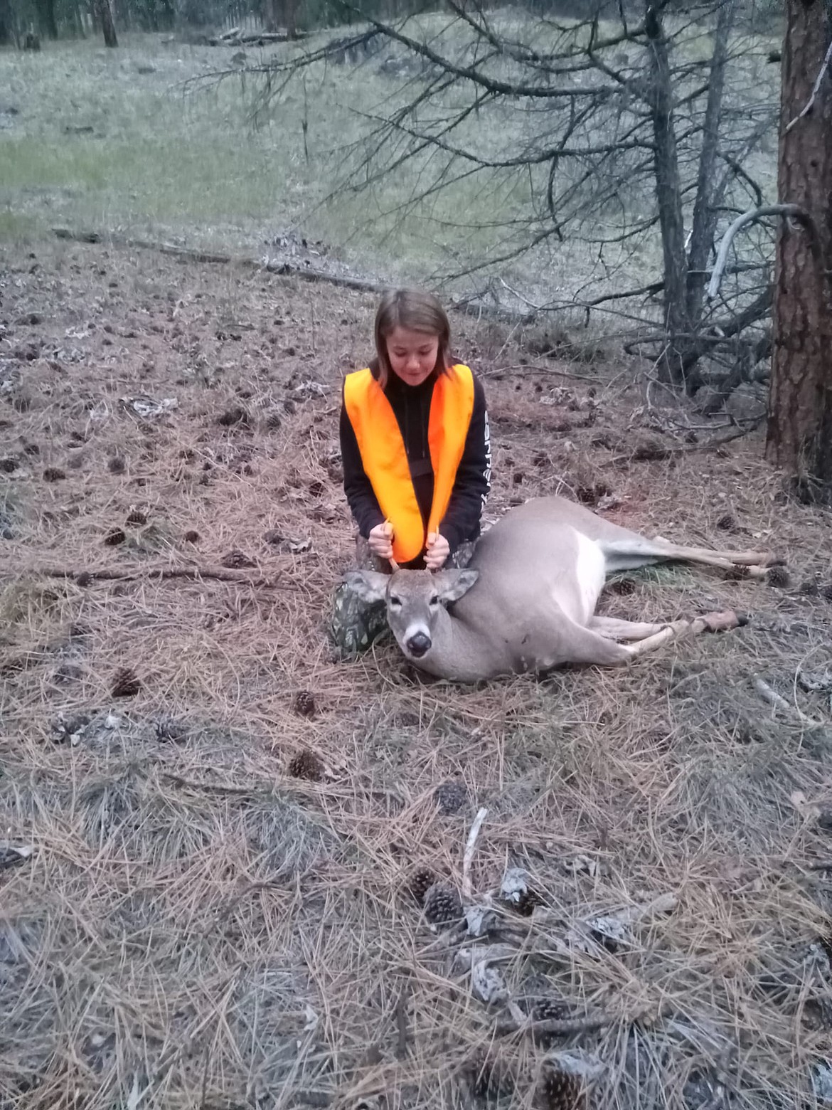 Superior's Koltynn Kelsey with a buck she harvest last week. (Photo Amy Becker Kelsey)