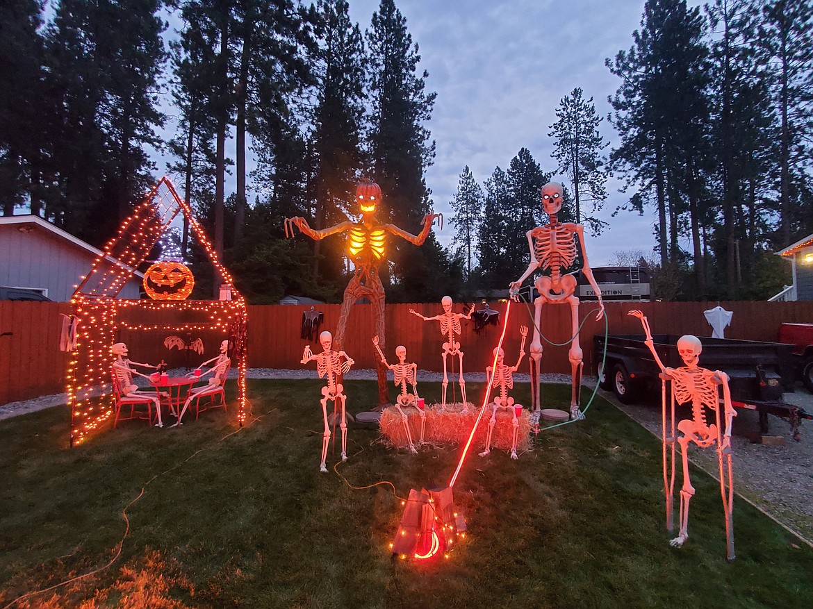 Kenny Travis - Skeleton Party on Ezy Street in Coeur d'Alene. 
"My wife and my dad and I every year put up Halloween and Christmas decorations. Some people think I'm crazy but I love making people happy.   It's a lot of work but it's worth it when I get to see all the smiling faces! I start building props in my backyard in August For Halloween. We try to do something different every year. We live at 4820 North EZY street 83815 IN CDA.  This is only one section of our yard...We have a Volkswagen bug we turned into a spider in our front yard and a lot more other fun props. Come stop by and check it out. All the lights come on at 4:30.