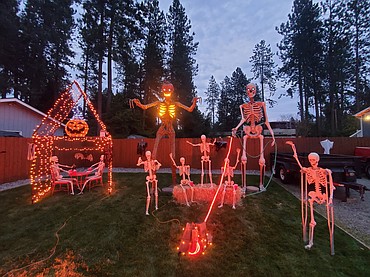 Kenny Travis - Skeleton Party on Ezy Street in Coeur d'Alene. 
"My wife and my dad and I every year put up Halloween and Christmas decorations. Some people think I'm crazy but I love making people happy.   It's a lot of work but it's worth it when I get to see all the smiling faces! I start building props in my backyard in August For Halloween. We try to do something different every year. We live at 4820 North EZY street 83815 IN CDA.  This is only one section of our yard...We have a Volkswagen bug we turned into a spider in our front yard and a lot more other fun props. Come stop by and check it out. All the lights come on at 4:30.