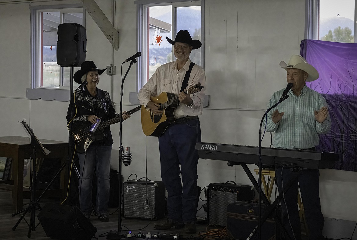 Western Sky Band from Trout Creek performs at the Cancer Network auction. (Tracy Scott/Valley Press)