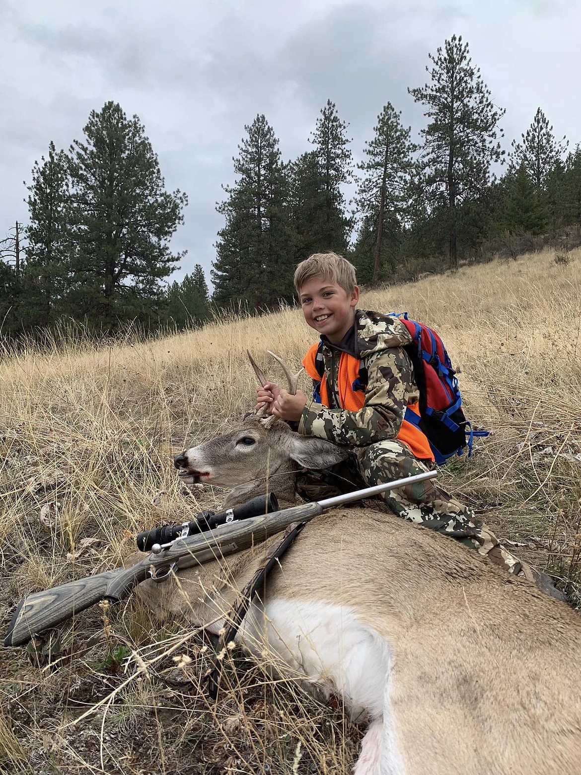 Zaimon Firestone of Superior with a buck he harvested during the youth hunter last week. (Sammijo Firestone photo)
