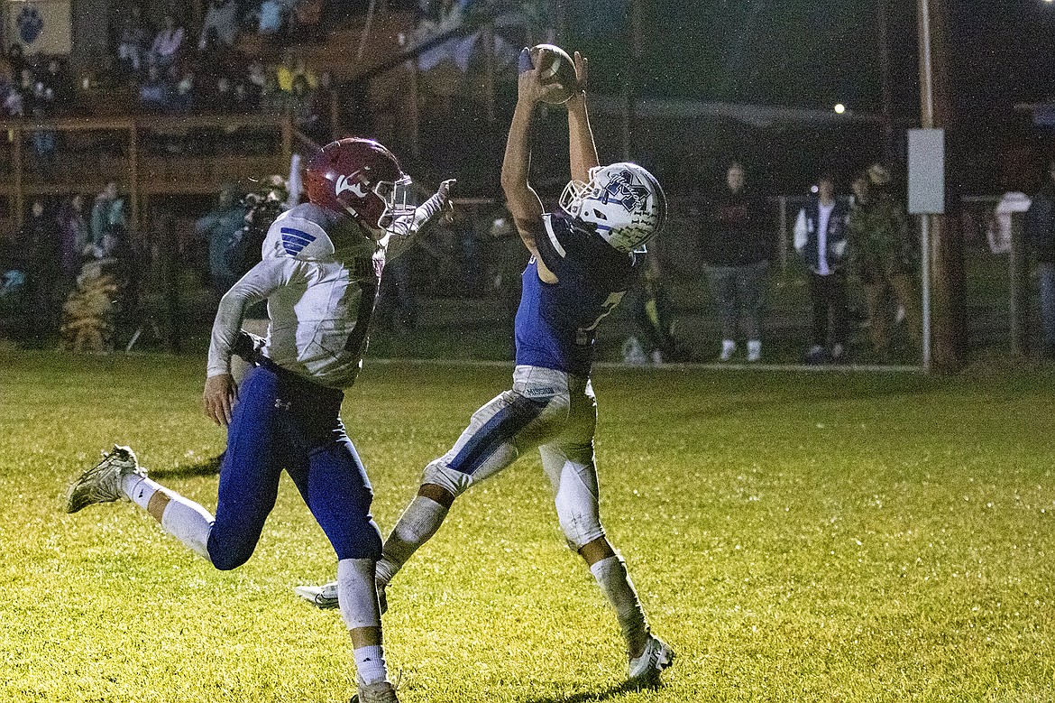 Mission Bulldog Iyezk Umphrey snags a Kellen McClure pass for a touchdown. (Rob Zolman/Lake County Leader)