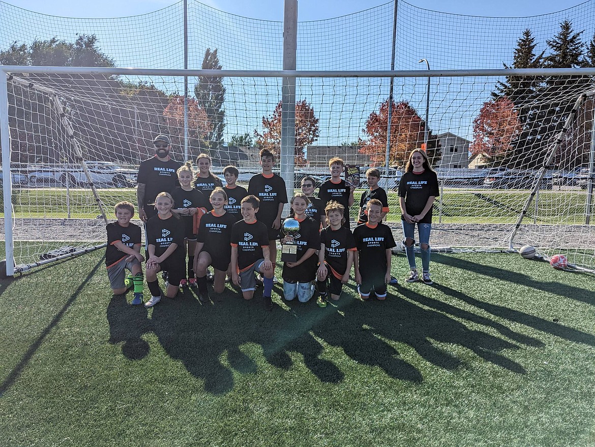 Courtesy photo
Orange Chicken won the 5th/6th grade soccer championship in Real Life Sports. In the front row from left are Tanner Matuszak, Olivia Meredith, Ava Keppner, Peter Ratcliffe, Olivia Emery, Camdyn Thompson and Michael Lee; and back row from left, coach Josh Emery, Birdie Cox, Carlyn Harte, Cayden Teal, Jax Molenaar, Jacob Nystrom, Macklin Gillis, Reise Reardon and Kiya.