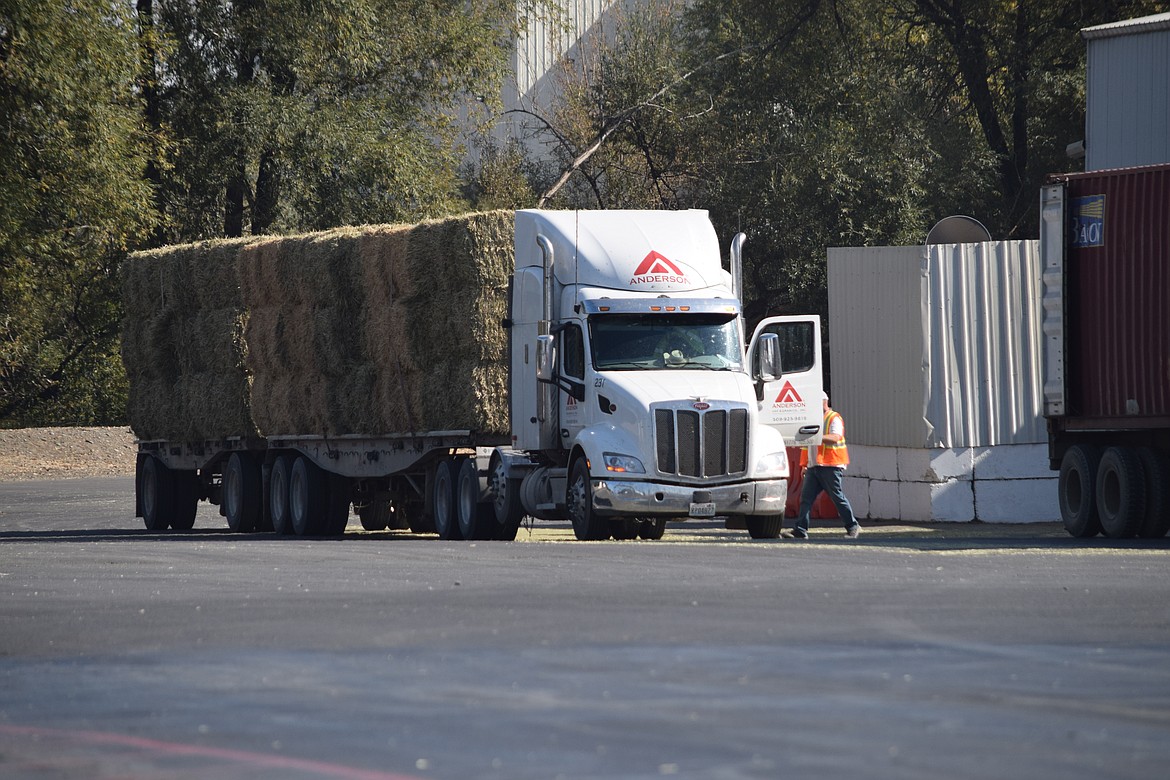A hay truck sits in the parking lot of Anderson Hay and Grain in Ellensburg. The company, founded in 1960, specializes in exporting timothy and alfalfa hay, primarily to Asia.