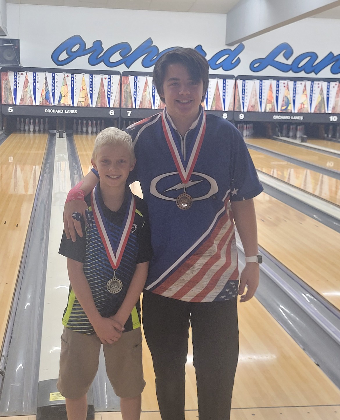 Courtesy photo
Kenton Still, left, of Post Falls and Colin Borgaro of Coeur d’Alene wear their medals from the Idaho Junior Bowlers Tour tournament this past weekend at Orchard Lanes in Lewiston. Kenton finished 2nd in the B Division (149 and under) and Colin finished 3rd in the Classic Division (175 and up).
