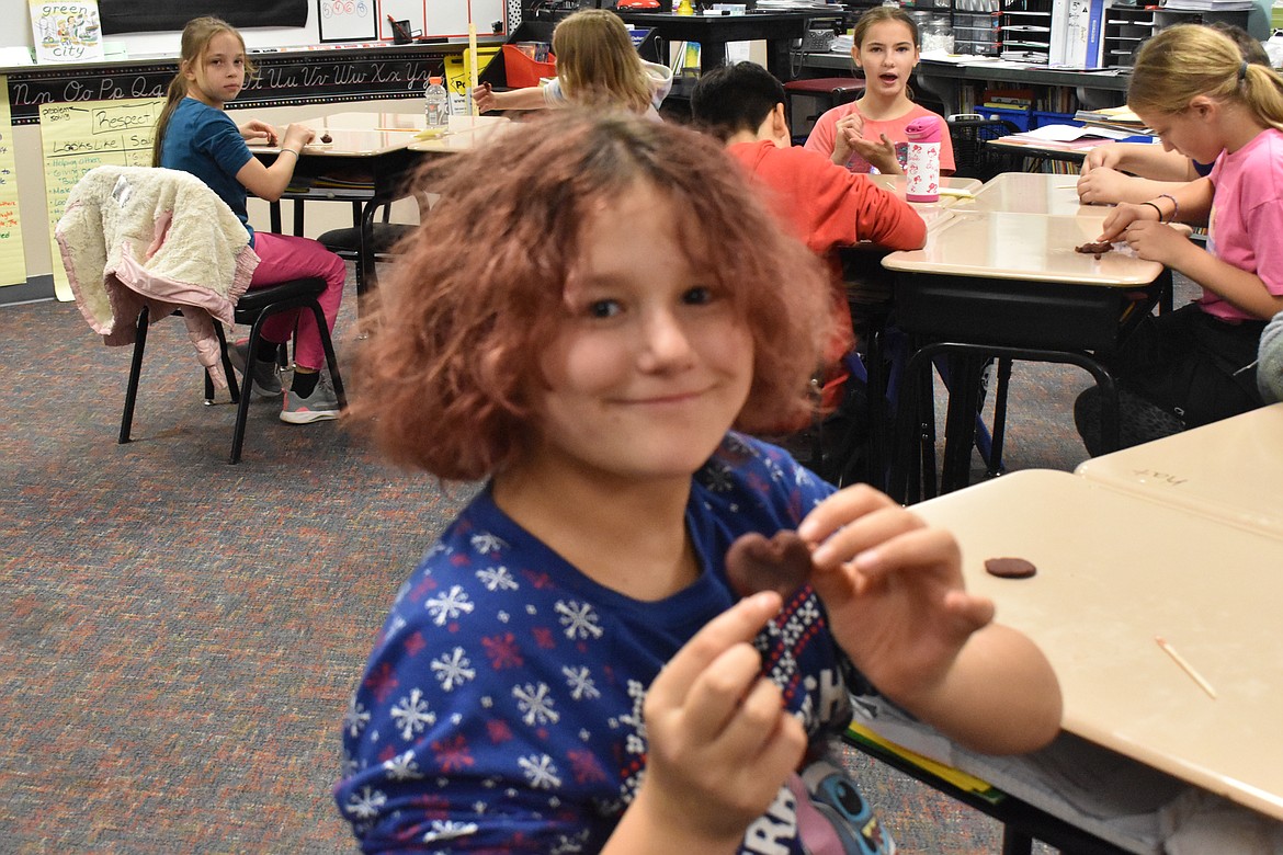 Many students were excited to show their art once they were done sculpting the wax.