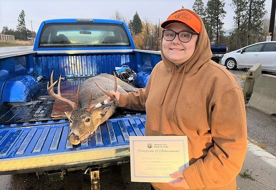 Cassidy Murphy with her first white-tailed buck. (FWP photo)