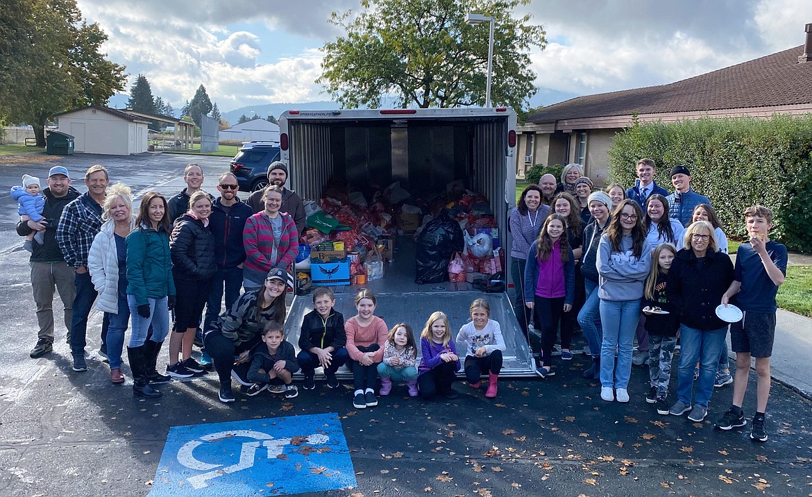 The Church Of Jesus Christ of Latter-day Saints and local groups gathered more than 5,200 pounds of donations including food, diapers, wipes, toilet paper and more from Post Falls and Coeur d'Alene on Wednesday. Church members distributed empty red bags and returned to pick them up Thursday morning, filled with contributions from the community. 
"It’s a privilege to help those in our community," church member Claire Allred said. "People blew us away with their generosity."
The donations were distributed by the church and volunteers to local food banks.