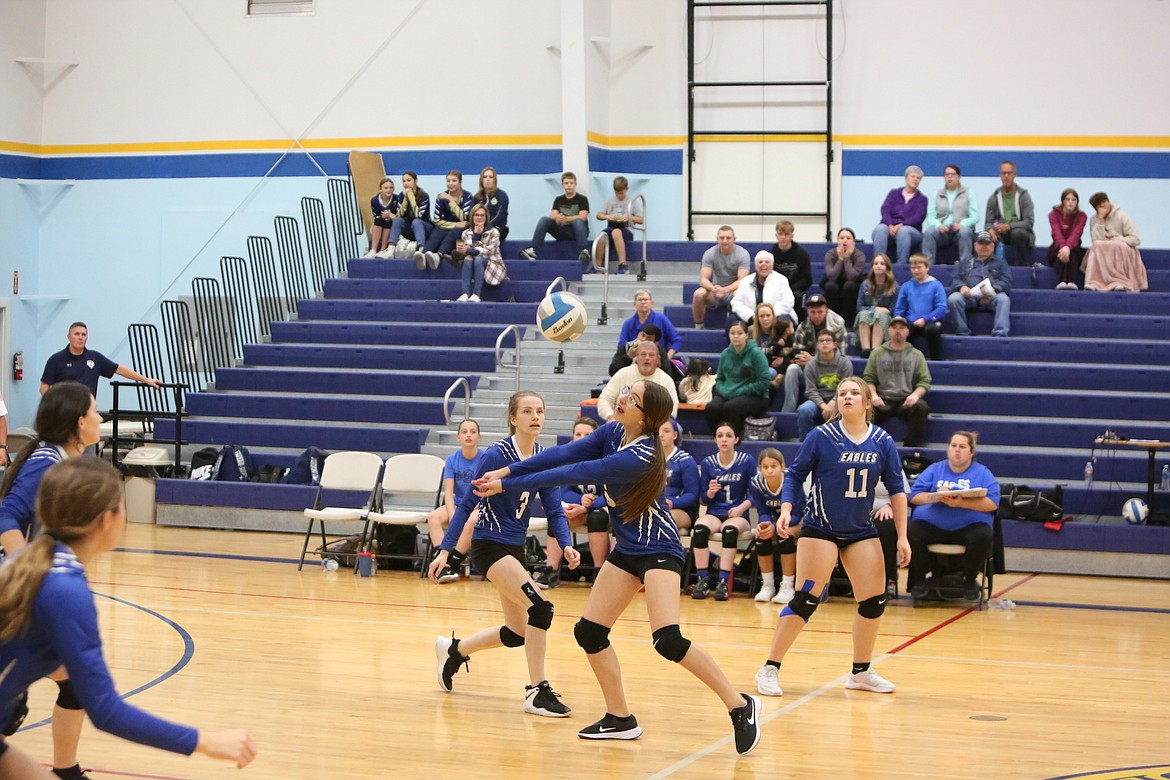 Soap Lake freshman Tanya Zubritiskiy passes the ball over the net against Wilson Creek.