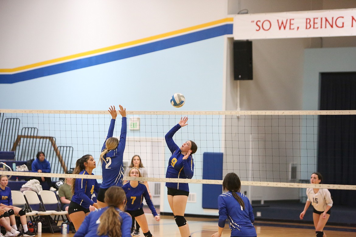 Wilson Creek sophomore Neeley Odorizzi rises to send the ball above an outstretched Soap Lake defender.