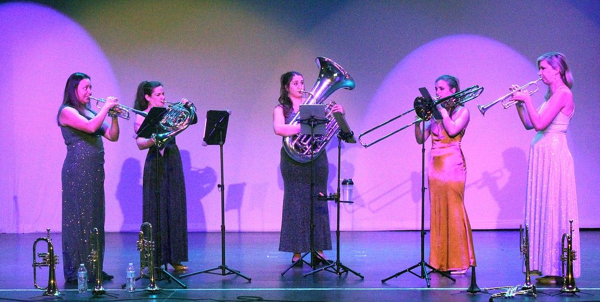 Trumpeters Raquel Samayoa, left, and Mary Elizabeth Bowden, right, trade melodies on “Central Park Morning,” backed by horn player Rachel Velvikis, tuba player Cristina Cutts Dougherty and trombonist Victoria Garcia.