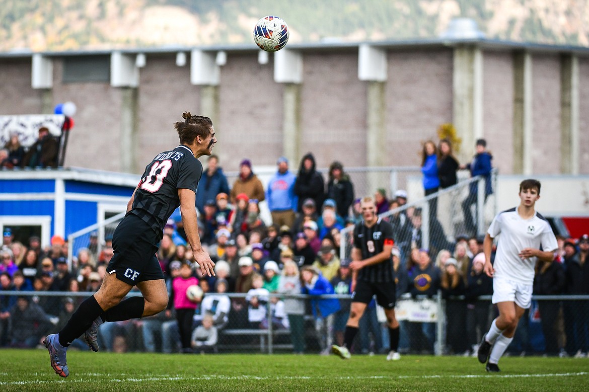 Columbia Falls' Kai Golan (10) heads a ball over the Livingston keeper for a goal in the first half of the State A Championship game at Flip Darling Memorial Field in Columbia Falls on Saturday, Oct. 29. (Casey Kreider/Daily Inter Lake)
