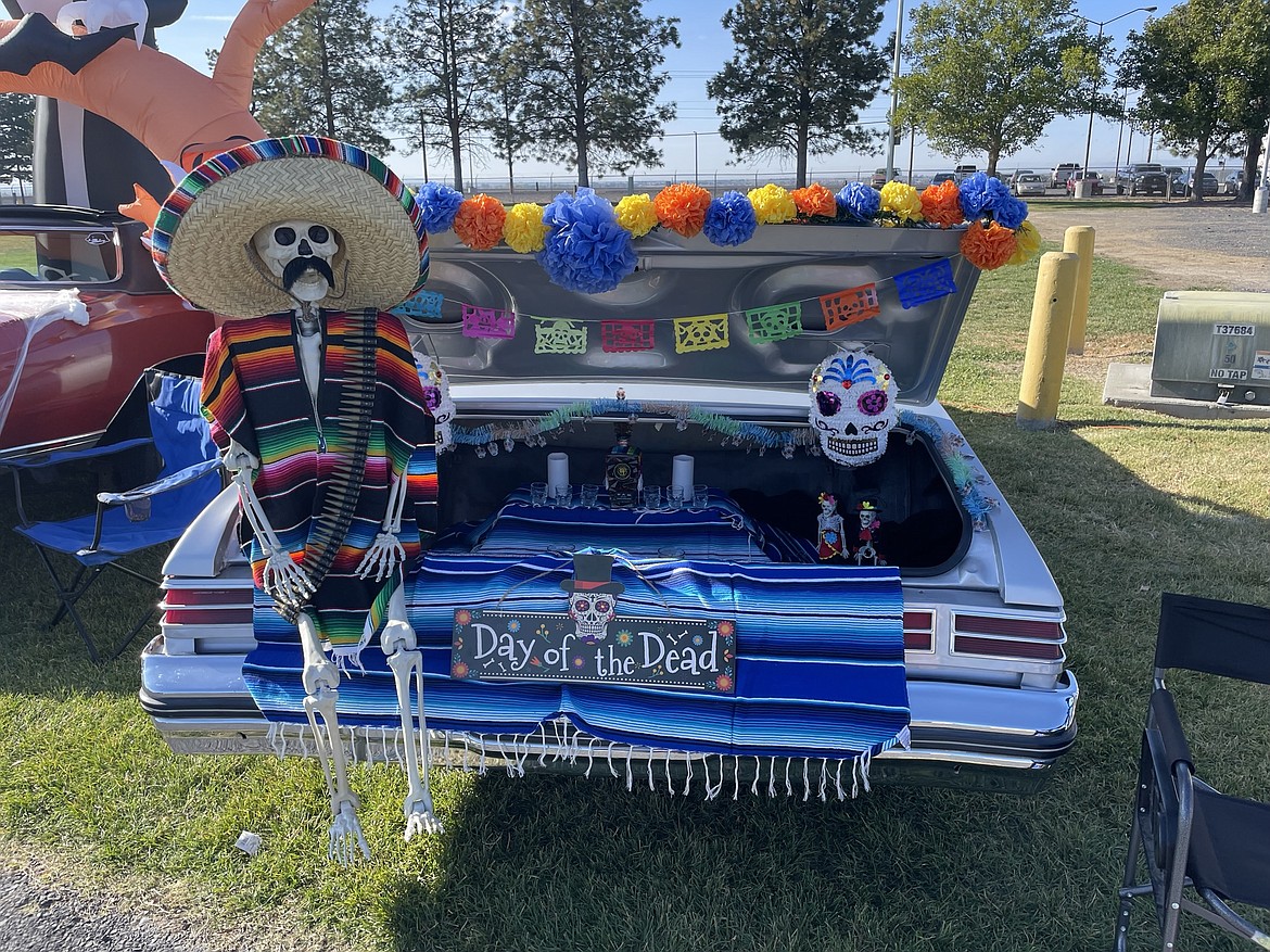 A lowrider ready for trunk or treat sits at the Grant County Fairgrounds on Saturday as part of the Moravida Festival — a celebration of the Mexican Day of the Dead.