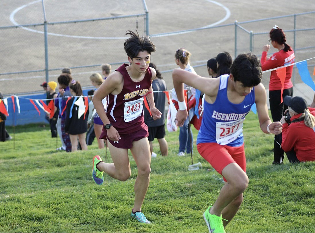 Moses Lake sophomore Niko Rimple runs uphill at the Columbia Basin Big 9 District Meet.