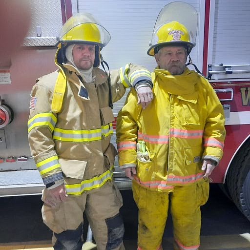 Joey Delatorre, left, and Randy Friley are volunteers with the West End Fire Department in DeBorgia. The West End and the St. Regis Volunteer Fire Departments received a grant to replace worn out gear that both departments are grateful to have swapped. (Monte Turner/Mineral Independent)