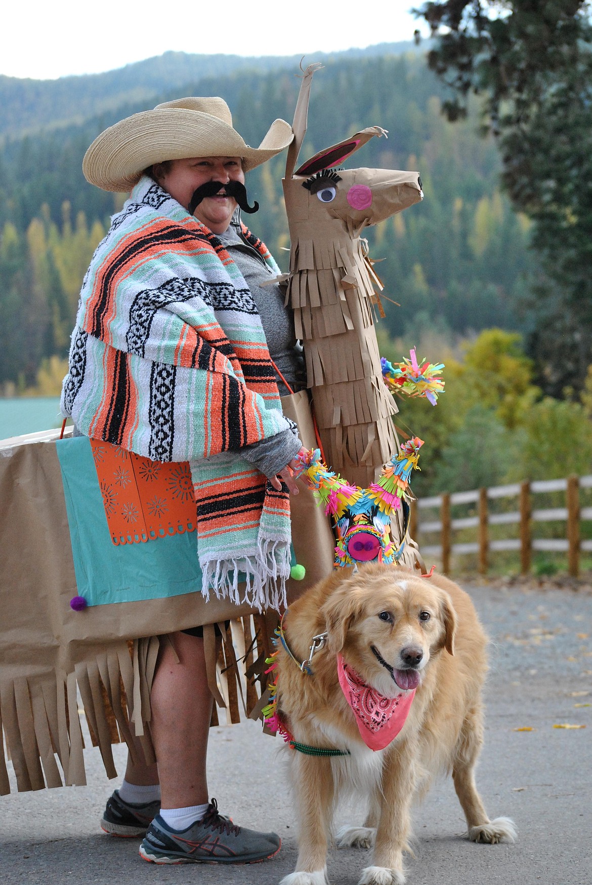 Perhaps next year's festival should include a best costume contest? Senorita Cheesman with her pinata pooch Charlie would have certainly won the award this time. (Amy Quinlivan/Mineral Independent)