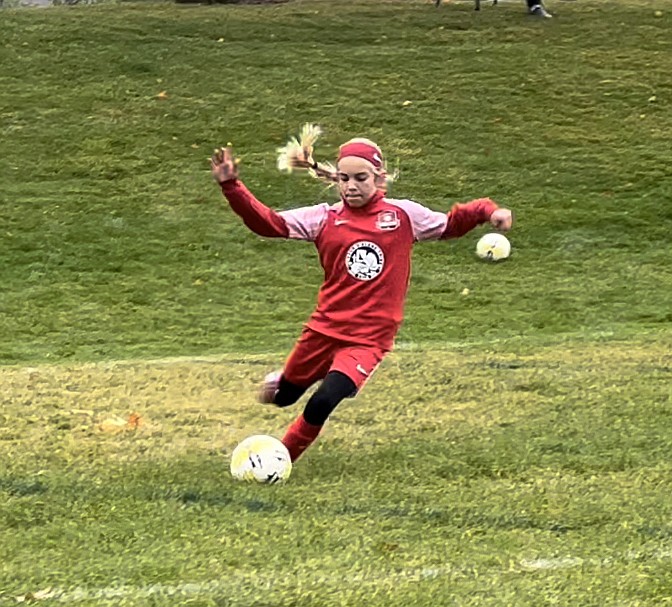 Photo by JULIE SPEELMAN
Evelyn Haycraft of the Thorns FC girls 11 soccer team sends the ball to a teammate in a recent game against the Spokane Sounders.