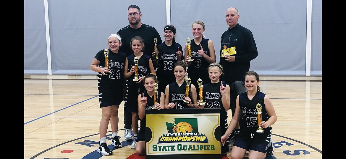 Courtesy photo
The sixth grade Cd'A Lakers AAU girls basketball team went 5-0 in the 2022 Boo Ball tournament in Spokane, defeating the Kalispell Rebels in the championship 47-31. In the front row from left are Gretah Angle, Noelia Axton, Brynlee Johnston and Savannah Stevens; second row from left, Emerson Cummings, Jaycee Bateman, Allie Jenkins and Payton Brown; and rear, coaches Corey Brown and Royce Johnston.