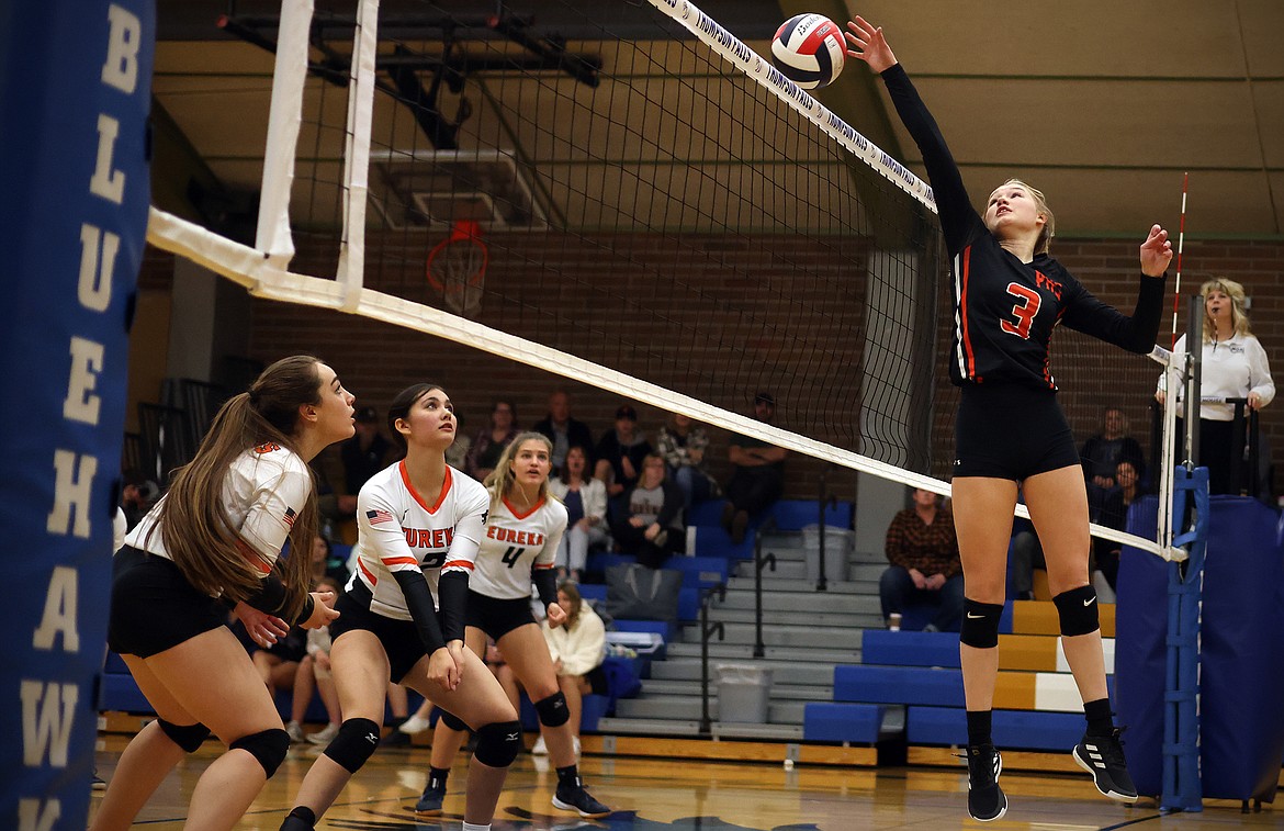 Piper Bergstrom rises above the net for a kill in the opening round of the 7B District Volleyball Tournament in Thompson Falls Friday. (Jeremy Weber/Daily Inter Lake)